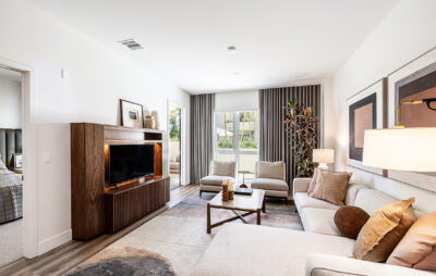 An open and bright modern living room inside one of The Crosby's new construction apartments Los Angeles.